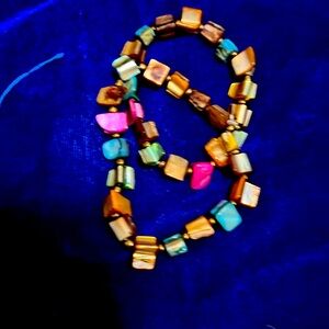 Pearl multi color Babylon coupled bracelet. Fairly used.